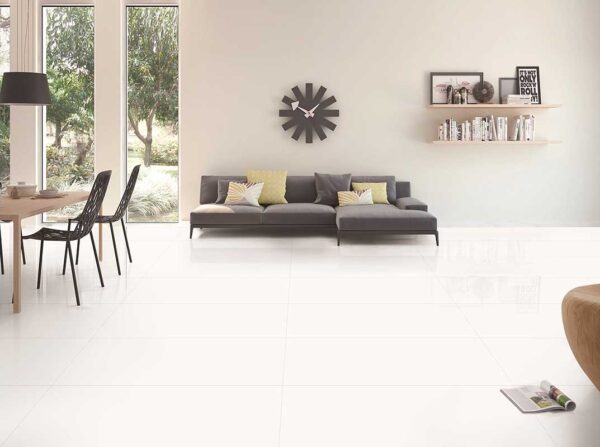 White Shade of Pullido Blanco Kajaria GVT Floor tiles at open space living room